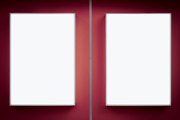 Two empty lightboxes on the wall.