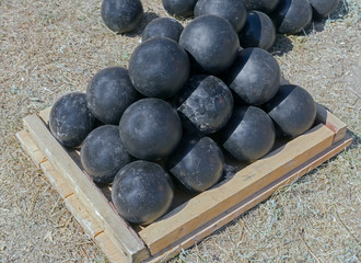 pyramid of black cannonballs
