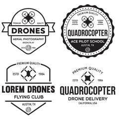 Obraz premium Set of drone logos, badges, emblems and design elements. Quadrocopter flying club, delivery logotypes.