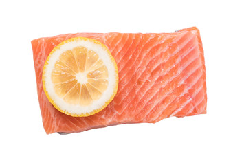 Steak of red fish, salmon with lemon, rosemary and thyme. Trout on white background.