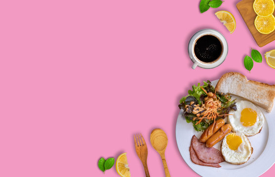 Breakfast full food in restaurant,  coffee,Eggs, Cheese, Bread, Salmon Steak,woodspoon,slud, Sliced ​​Lemon, top view.