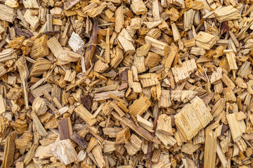 Background made of wood chips, closeup shot, wooden texture.