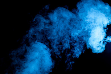 Blue billowing smoke on black background - obrazy, fototapety, plakaty