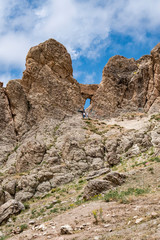Fototapeta premium Dogubayazıt, Turkey, Middle East: panoramic and breathtaking view of the footpath up to the rocks beside the ancient castle of Old Beyazit, near the Ishak Pasha Palace and Eski Bayezid Cami mosque