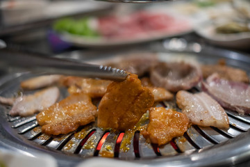 Pork grill on hot coals, Korean or Japanese BBQ Yakiniku style.