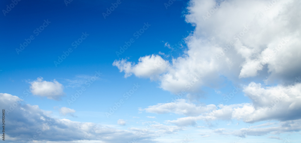 Wall mural blue sky and clouds background