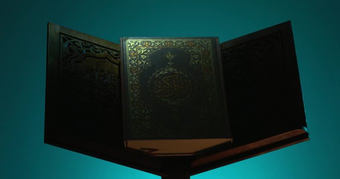 Light Passing over Holy Quran on Book Rest