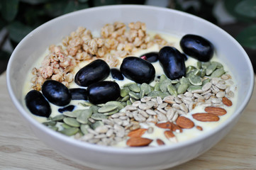 smoothie bowl,mango yogurt with fruit and almond