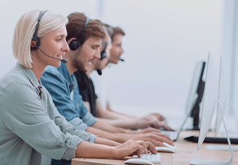 team of call center employees in the workplace