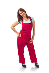 Attractive woman in red overalls, isolated on a white.