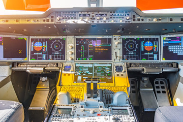 Jet airliner plane view inside the cockpit of the engine control panel, thrust and the main...