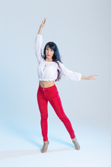 Latina dance, strip dance, contemporary and bachata lady concept - Woman dancing improvisation and...