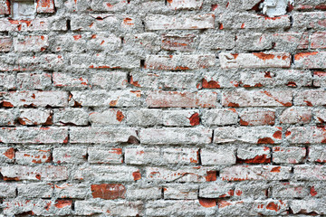 rusted damaged brick wall
