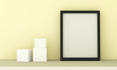 Naklejka na ściany i meble Blank picture frame for insert text or image inside and cubic on pastel yellow color.