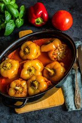 Pepper stuffed with minced meat and rice in tomato sauce.