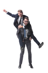 happy businessman carrying his colleague on the piggyback