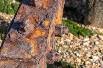 Shoeburyness anti submarine ww11 barrier going out to sea with rusted fittings