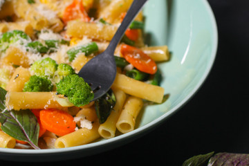 pasta salad with vegetables (warm appetizer snack, healthy food) menu concept. food background. copy space. Top view