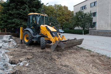 excavator stands on a construction site