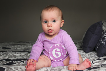 Close up portrait of 6 Month Old Cute Baby Girl, Infant with big blue eyes, New family concept, The most Beautiful Baby Princesse, Happy Baby Girl