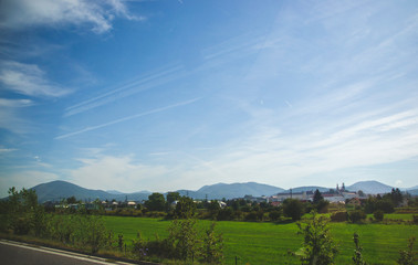 summer landscape with road and clouds