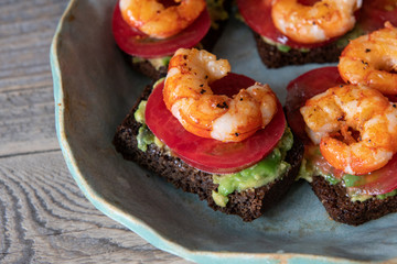 Sandwiches with prawns topping