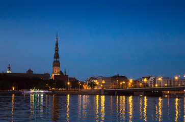 Obraz premium Riga, Latvia. View of the night city across the Daugava River