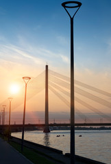 Riga, Latvia. Vansu suspension bridge over the Daugava River in the evening