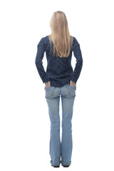 side view.a smiling young woman walks forward.