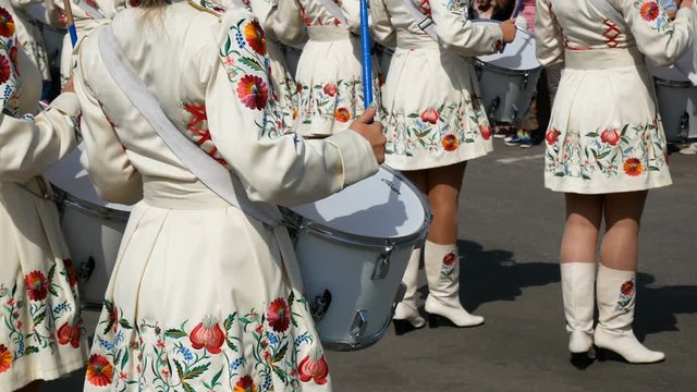 Marching band drummers perform, drummers parade in ukrainian costume