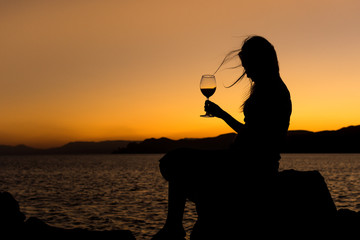Girl with a glass of wine