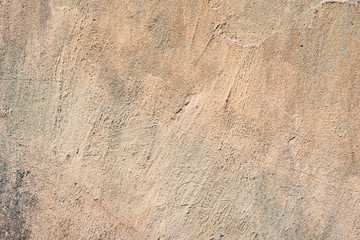 Texture of a concrete wall with cracks and scratches which can be used as a background