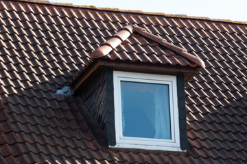 Dachgaube mit Fenster eines Hauses