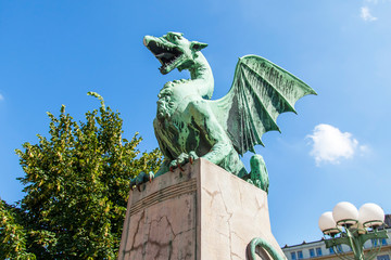 Ljubljana, Slovenia, August 5, 2019. picturesque dragon sculpture adorns Zmajski most