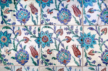 Ancient Iznik lapis tiles with floral pattern close up background