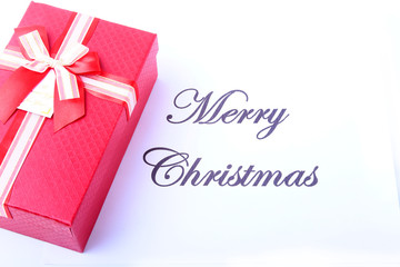 Text merry christmas on paper with gift box