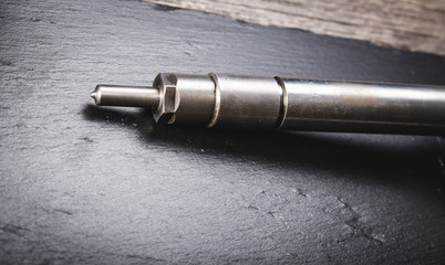 Two new nozzle for diesel fuel on a white background