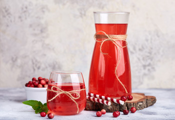 Healthy cranberry juice drink and fresh cranberries. Traditional Russian beverage mors © natkinzu