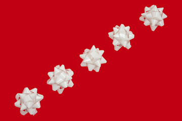 Festive Christmas composition in red and white. Christmas and New Year meeting concept. Place for text. The traditional colors of the Christmas holidays. Flatlay.