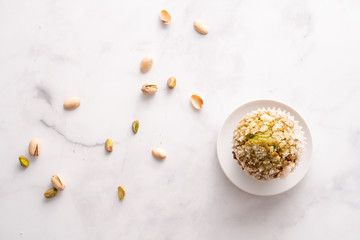 Homemade pistachio muffins with sugar crystals