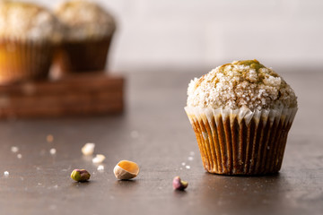 Homemade pistachio muffins with sugar crystals