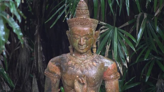 Buddhist statues in the tropical garden aerial photo