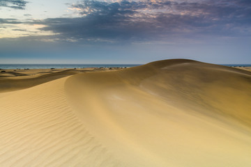 Fototapeta na wymiar Beautiful sand dunes view. Maspalomas dunes.
