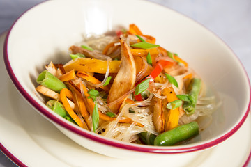 salad with grilled chicken breast and vegetables