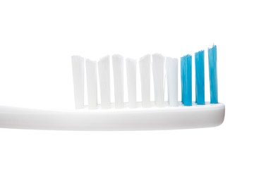 Toothbrush close-up, macro image on a white background, isolated.