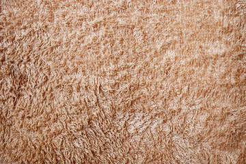 Soft towel texture background. Coffee color textile with pile