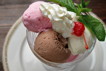 Colored ice cream balls . Restaurant menu