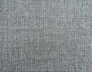Textured background of gray natural textile