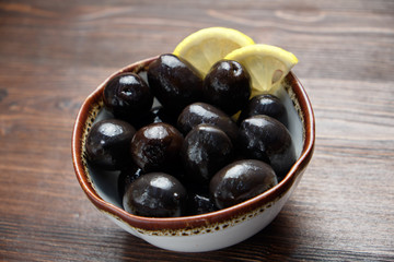 Olives and olives with lemon. menu for catering