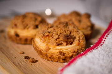 gourmet peach tart with homemade vanilla ice cream on a cutting board
